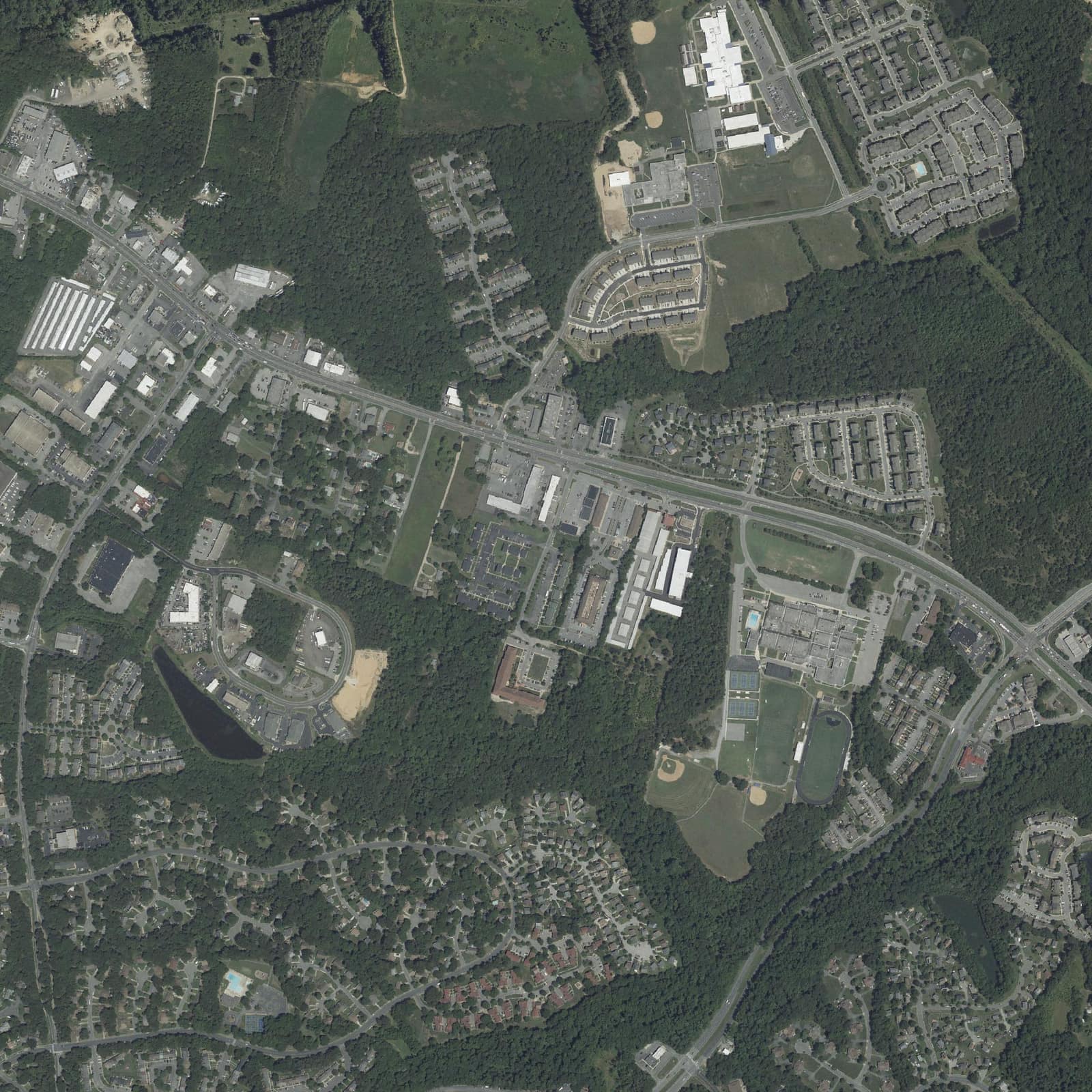 Aerial view of the neighborhood around Village Green Apartments